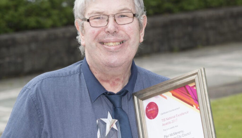 Photo of Paul McMenemy with his award