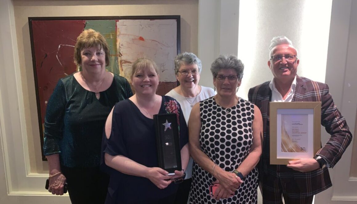 2019-06-15-22.27.52 NETRALT with award at TIS conference photo
